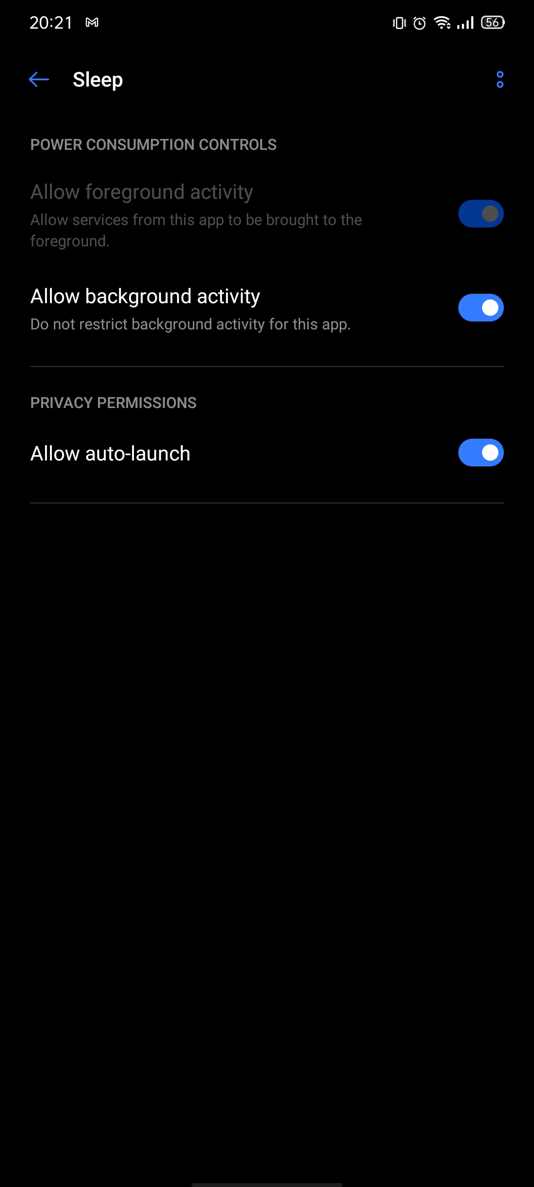 realme UI per-app power screen with Allow auto-launch and Allow background activity switched on